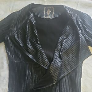 Sleek Black Leather Jacket with Dramatic Collar